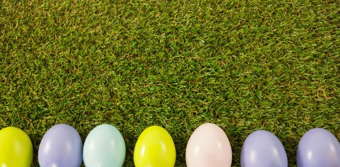 Fototapeta na wymiar Colored Easter eggs on grass