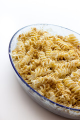 Fusilli pasta with sauce and nuts