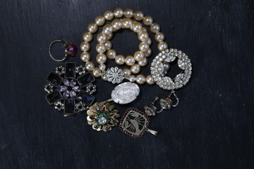 Vintage jewelry on black background 