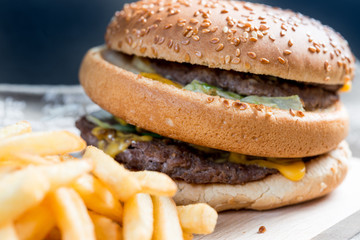 American cheese burger with Golden French fries