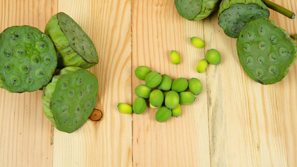 Lotus seed green on wooden background