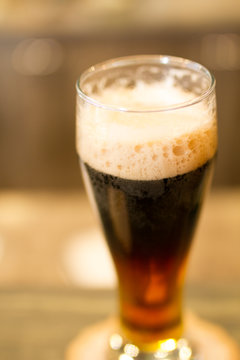 Glass of dark beer