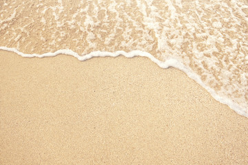 Soft wave lapped the sandy beach, Summer Background.