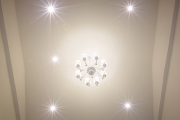 Bottom view to top of contemporary white crystal pendant lamp.