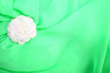 Green wedding balls celebrate abstract background with textile rose decoration - obrazy, fototapety, plakaty