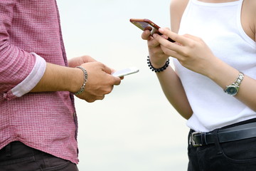 communication on mobile during man and woman