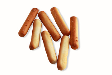 Bread sticks top view on white background.