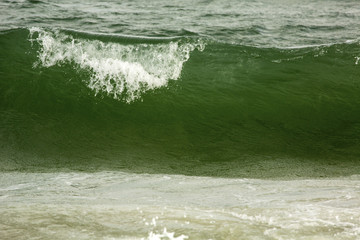 Closeup of big wave breaking on Assateague Island, Maryland.