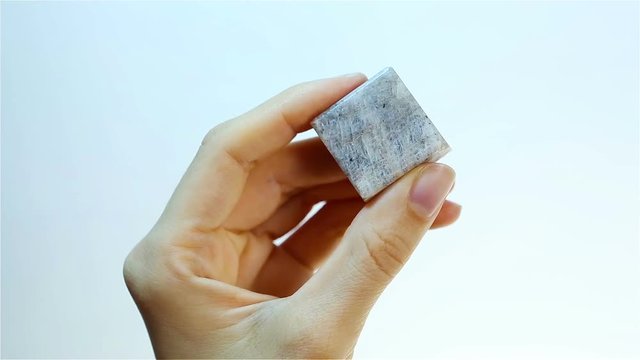 Adularia - Moonstone (Orthoclase or Belomorite). Jeweler holding Adularia