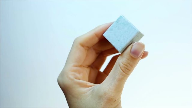 Jade &ndash; is green rock. Jeweler holding Jade mineral