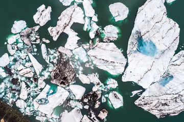 Aerial view of icebergs floating in Jokulsarlon Lagoon by the southern coast of Iceland