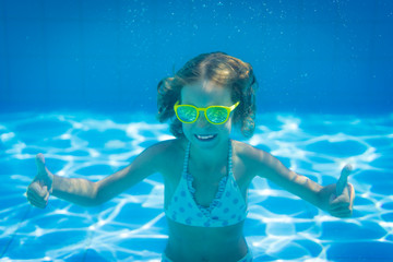 Underwater portrait of child