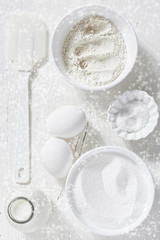 Christmas ingredients flour sugar eggs, white on white