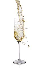 Splash of white wine in glass with reflection