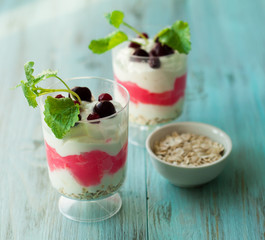 Berry dessert, smoothies with oatmeal, yogurt and cream. The concept of a healthy diet