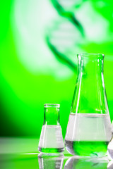 Science laboratory research and development concept. microscope with test tubes