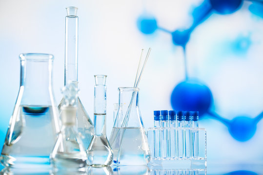Science laboratory research and development concept. microscope with test tubes
