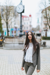 Fototapeta premium Business woman walking on a street.