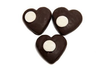 Obraz na płótnie Canvas Cookie heart in chocolate isolated