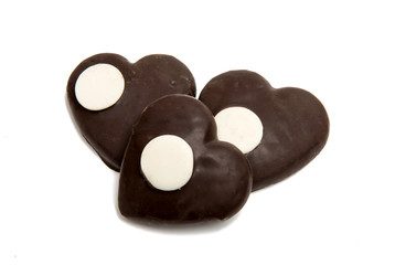 Cookie heart in chocolate isolated