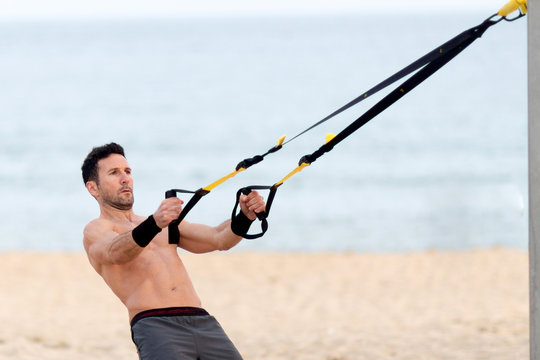 Schlingentraining am Strand
