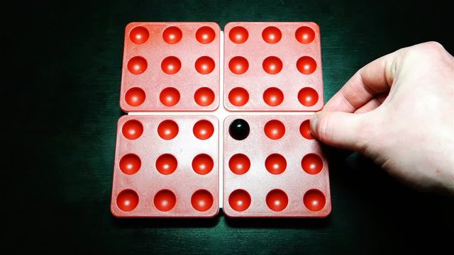 the player puts a black ball on an arbitrary place in the game field of the game Pentago