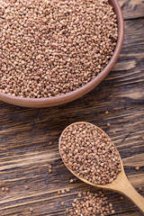 plate with raw buckwheat