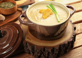 Delicious cream soup with bread, closeup