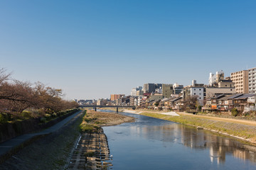 Fototapeta na wymiar Kamo river view - Kyoto Japan - Matsubara brige