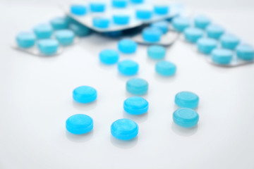 Cough drops on white background