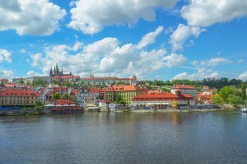 Prague cityscape with a view of Prague Castle and St Vitus Cathedral from Charles Bridge.