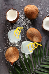 Beautiful composition with coconut water on table