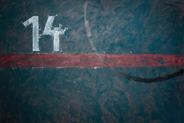 Empty grunge wall with number 14