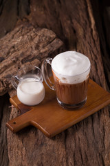 Cold Chocolate Milk drink on wooden background