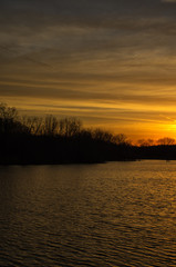 Sunrise over a lake near the Des Moines river