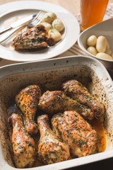 Baked chicken drumsticks with potatoes