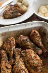 chicken drumsticks in baking dish