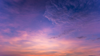 Colorful dramatic sky with cloud at sunset.Sky with sun background.