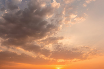 Colorful dramatic sky with cloud at sunset.Sky with sun background