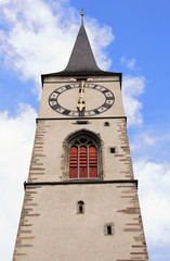 Fototapeta na wymiar historic clock tower in the old town of Chur, Switzerland