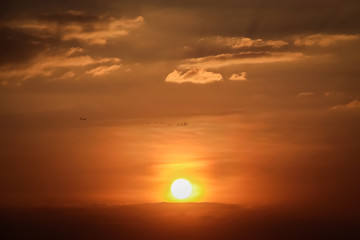 Sun on sunset sky