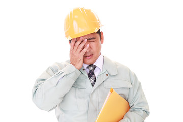 頭痛を訴える男性