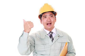 ガッツポーズの作業員