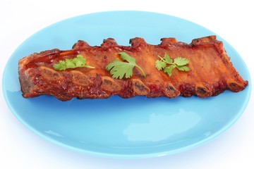 Grilled BBQ pork ribs on plate