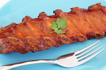 Grilled BBQ pork ribs on plate