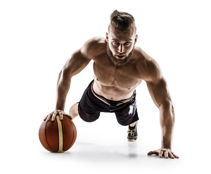 Physical athlete doing push-ups on ball. Photo of muscular man isolated on white background. Strength and motivation.