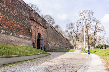 The brick walls and gate of the old fortress of Vysehrad. Area of the old town in Prague, Czech Republic.