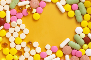Fototapeta na wymiar Heap of colorful pills
