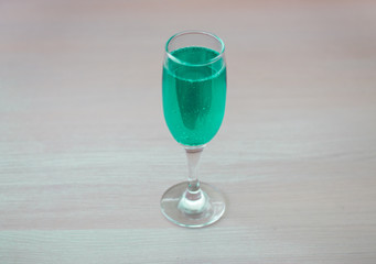 Green drink in a glass.
