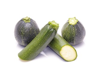 Courgette or zucchini on a white background
